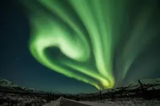 'Surfing' particles: Physicists solve a mystery surrounding aurora borealis