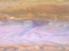 Hot spots ride a merry-go-round on Jupiter