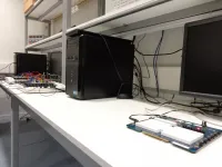 A remote laboratory for performing experiments with real electronic and communications equipment