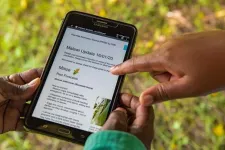 African smallholder farmers benefit from reduced crop losses and higher incomes from a novel pest alert service