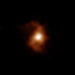 ALMA discovers the most ancient galaxy with spiral morphology