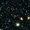 Astronomers identify most distant galaxy cluster