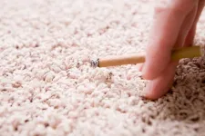 Carpets retain a stubborn grip on pollutants from tobacco smoke