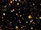 Cosmic magnifying lenses distort view of distant galaxies