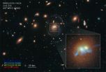 Hubble spots spiral bridge of young stars linking two ancient galaxies