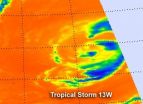 Infrared NASA imagery shows a weaker Tropical Storm 13W