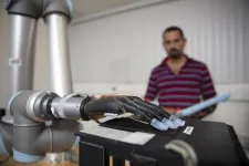 Liquid metal sensors and AI could help prosthetic hands to feel