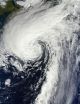 NASA catches last image of Rafael as a hurricane, now merged with front