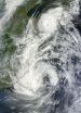 NASA satellites see Tropical Storm Saola and Typhoon Damrey arm-in-arm near China