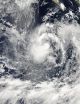 NASA sees fragmented thunderstorm bands wrapped around Tropical Storm Karina