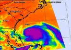 NASA sees Hurricane Arthur's cloud-covered eye 2