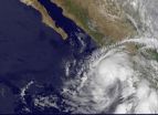 NASA sees Hurricane Beatriz wink on the Mexican coast