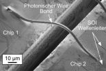 Optical waveguide connects semiconductor chips 