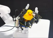 Robotic hand rotates objects using touch, not vision