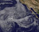 Satellite sees post-Tropical Cyclone Lane fizzle in a blanket of low clouds