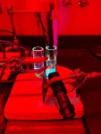 Self-powered pump harnesses light and chemistry to target, capture pollutants