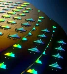 The first commercially scalable integrated laser and microcomb on a single chip