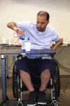 Transcutaneous stimulation improves hand function in people with complete tetraplegia